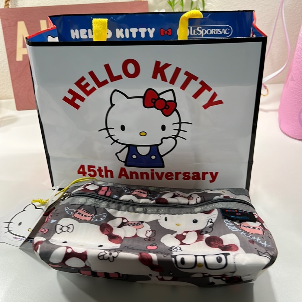 NWT Hello Kitty LeSportsac 45th anniversary cosmetic pouch w/ shopping bag.